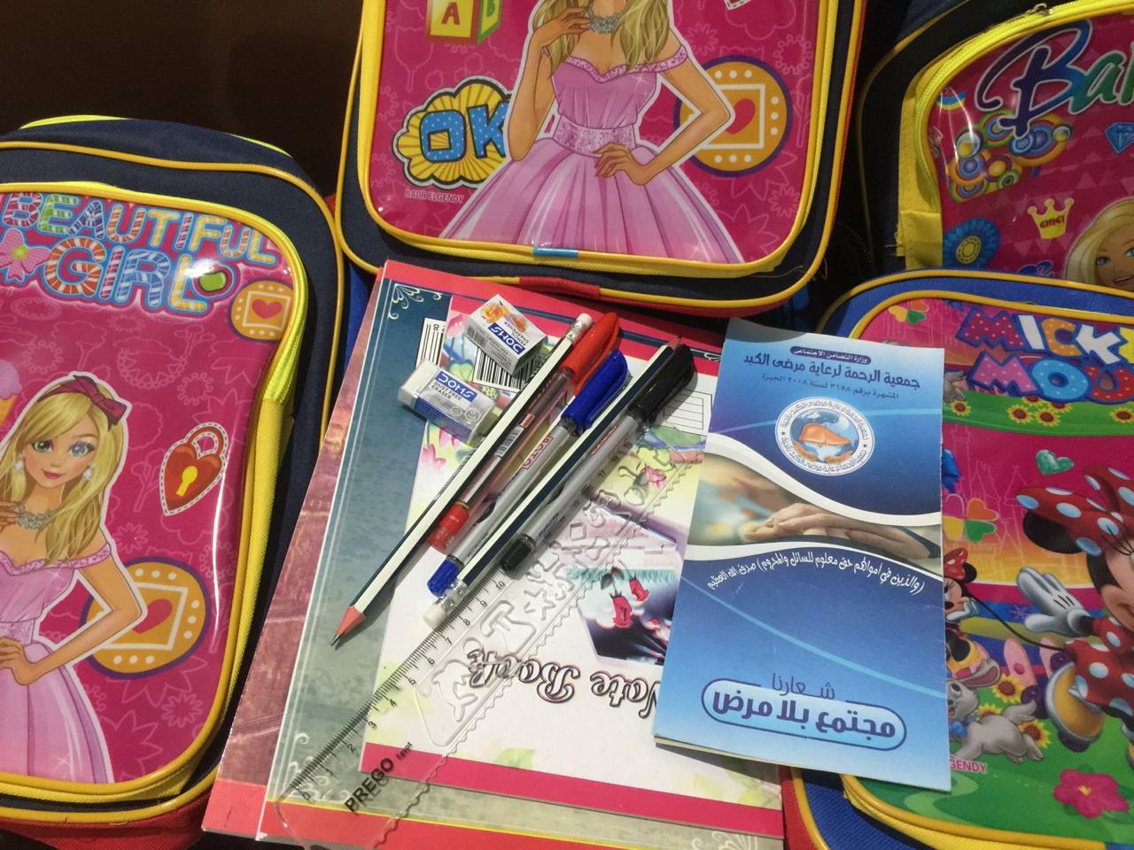 توزيع حقائب وأدوات مدرسية على الأسر الأكثر احتياجًا بالقاهرة والإسكندرية